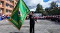 В гимназии №9 «Гармония» открыли класс юных пограничников, 19 ребят получили зеленые фуражки и флаг движения «Юные друзья пограничников»